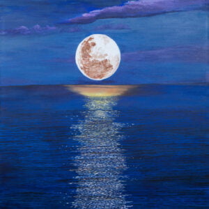 The moon path illuminates the ocean..